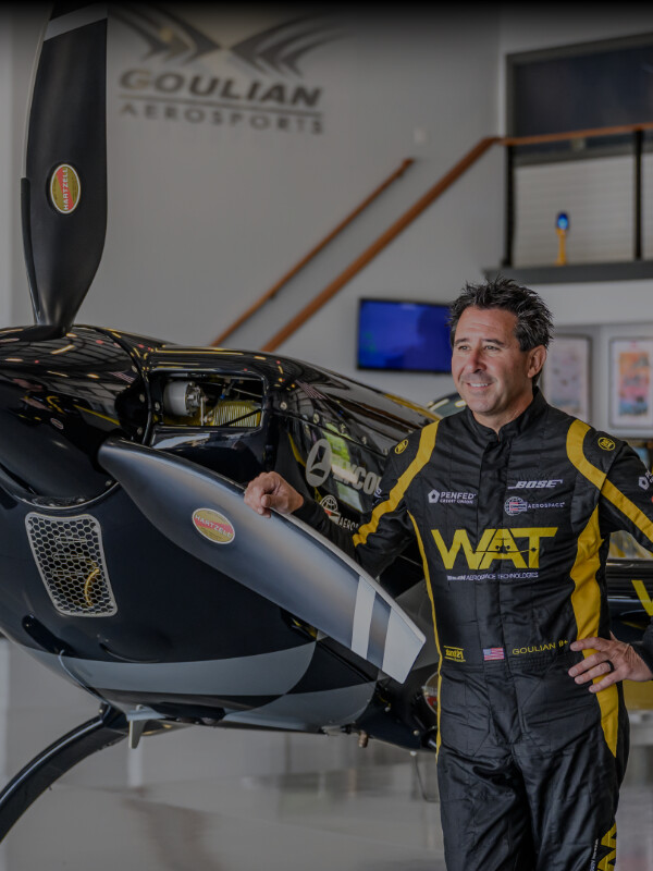 Michael Goulian poses next to a Hartzell Propeller